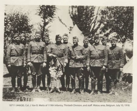 United States Army, Signal Corps. 1918. &quot;Col. J. Van B. Metts of 119th Infantry, Thirtieth Division, and staff, Belgium, July 10, 1918.&quot; State Archives of North Carolina. Military Collection, World War I Papers, XII. Photographs and Postcards, Box 1.